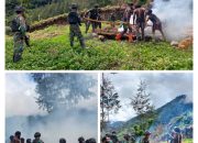 SELAMAT NATAL DAN TAHUN BARU 2024 – SATGAS TNI 300 SILIWANGI BERSAMA MASYARAKAT BAKAR BATU DI DANGBET, KAB.PUNCAK PAPUA